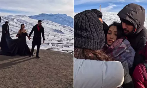 பனி படர்ந்த பள்ளத்தாக்கில் போட்டோஷூட் நடத்திய ஜோடி- வீடியோ வைரல்