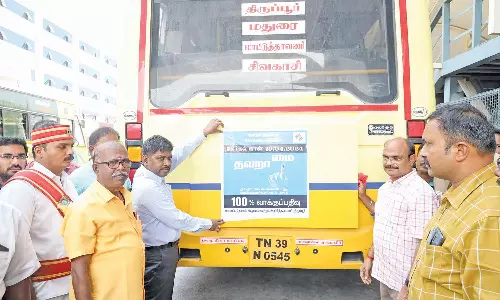 100 சதவீதம் வாக்களிக்க வலியுறுத்தி அரசு-தனியார் பஸ்களில் விழிப்புணர்வு ஸ்டிக்கர்