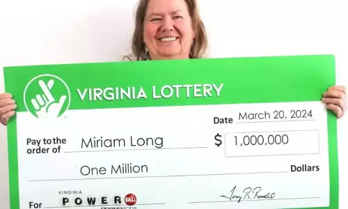 தவறுதலாக அழுத்திய பொத்தான் மூலம் பெண்ணுக்கு ரூ.8 கோடி லாட்டரி பரிசு