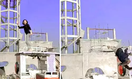 மின்சார ஆட்டோ கூரையில் நடனம் ஆடிய வாலிபர்