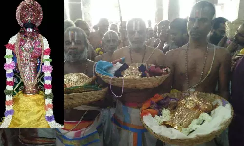 ரத்தின அங்கி அலங்காரத்தில் பூதத்தாழ்வார்