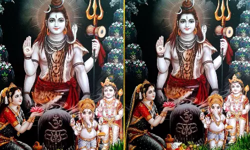 புடவை கட்டும் அர்ச்சகர்