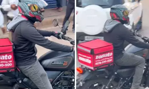 நவீன பைக்கில் உணவு வினியோகம் செய்யும் ஜொமோட்டோ ஊழியர்