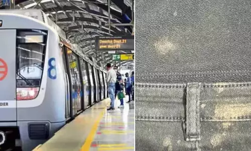 மெட்ரோ ரெயில் நிலையத்தில் பெண் மீது எச்சில் துப்பிய வாலிபர்