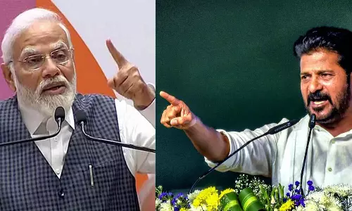 மோடி ஒரு கருநாகப் பாம்பு- ரேவந்த் ரெட்டி