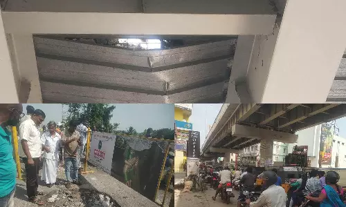 மார்த்தாண்டம் மேம்பாலத்தில் திடீர் உடைப்பு