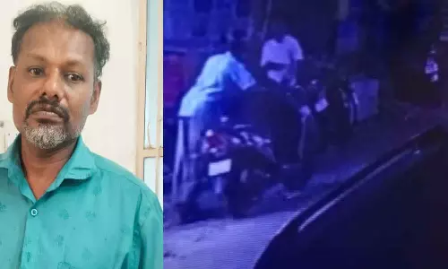 மோட்டார் சைக்கிளை திருடி நம்பர் பிளேட்டை மாற்றி பயன்படுத்திய தொழிலாளி கைது