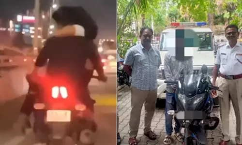 காதலியை மடியில் உட்கார வைத்து மோட்டார் சைக்கிள் ஓட்டிய வாலிபர் கைது