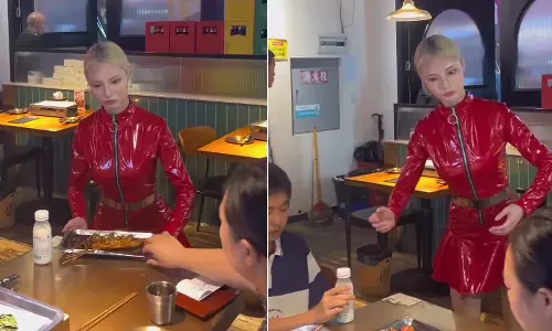 ரோபோ போன்று உணவு பரிமாறிய பெண்- வீடியோ வைரல்