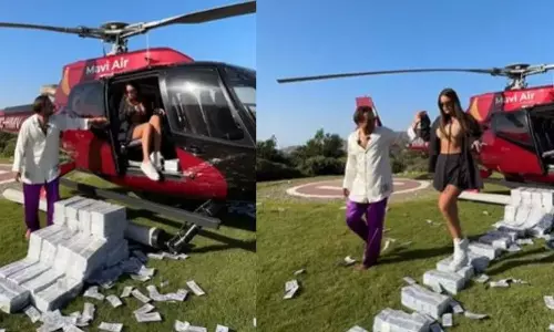 பணத்தின் மீது காதலியை நடக்க வைத்த தொழிலதிபர்- வீடியோ வைரல்