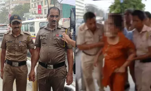 பெண்ணை காப்பாற்ற கடலில் குதித்த போலீசார்- வீடியோ