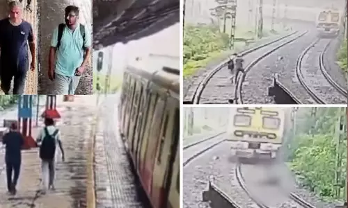 கைகோர்த்தபடி  ரெயில் முன் விழுந்து தற்கொலை செய்த தந்தை - மகன்.. பதறவைக்கும் சிசிடிவி  காட்சி