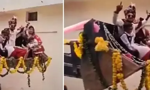 அது அம்பானி ஸ்டைல், இது எங்க ஸ்டைல் - புல்டோசரில் மணமக்கள் ஊர்வலம் - வீடியோ வைரல்