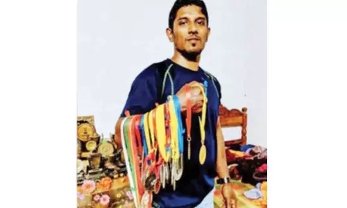 கை மல்யுத்தத்தில் சாதனை- நிதி இல்லாததால் உலக சாம்பியன்ஷிப் போட்டியை தவற விட்ட ஆட்டோ டிரைவர்