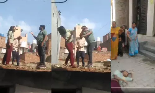 நிலத் தகராறால் வாக்குவாதம்- இளம் பெண்ணை முதல் தளத்தில் இருந்து தள்ளிவிட்ட அதிர்ச்சி வீடியோ