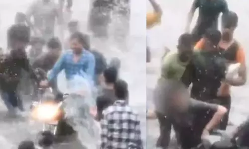 வெள்ளத்தில் சிக்கிய பெண்ணை துன்புறுத்திய கும்பல்... வீடியோ வைரல்- 4 பேர் கைது