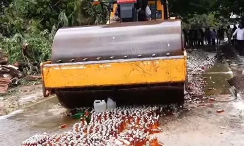 திருப்பதியில் மது பாட்டில்கள் அழிப்பு