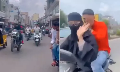 Burqa bike stunt