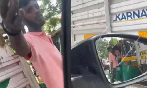 பெங்களூருவில் கற்பழிப்பு மிரட்டல் விடுத்து கார் கண்ணாடியை உடைத்து பெண்ணை தாக்க முயன்ற நபர்