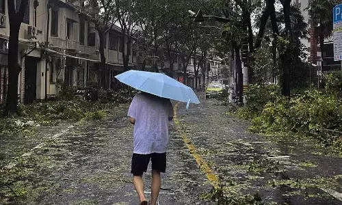 சீனாவில் புயலால் 100 விமானங்கள் ரத்து