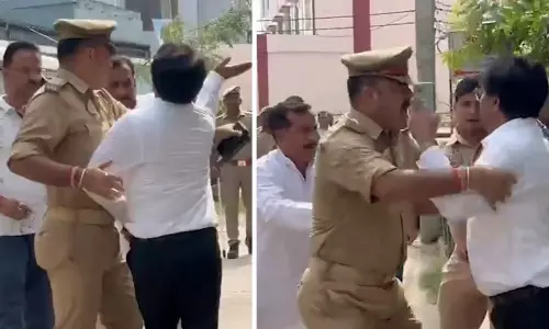 போலீஸ் கண் முன்னே பா.ஜ.க. எம்.எல்.ஏ.-வை ஓங்கி அறைந்த வழக்கறிஞர் - வீடியோ வைரல்