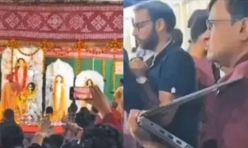 வொர்க் ஃப்ரம் கோவில்.. நரம்பெல்லாம் ஐடி இரத்தம் ஊறிய ஊழியர்.. துர்கா பூஜையில் செய்த செயல்