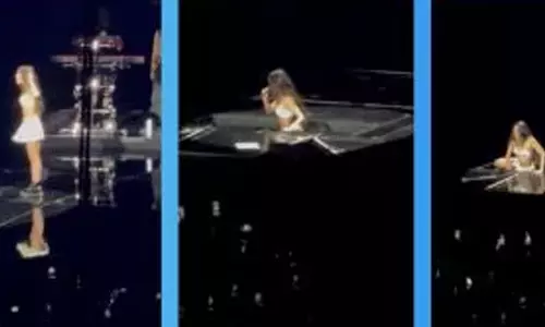 மேடையில் தடுமாறி விழுந்த பாப் பாடகி- வீடியோ வைரல்