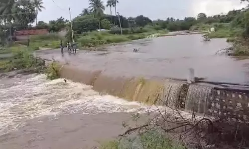 நம்பியூர் பகுதியில் பலத்த மழை- 2-வது முறையாக தரைப்பாலம் மூழ்கியது