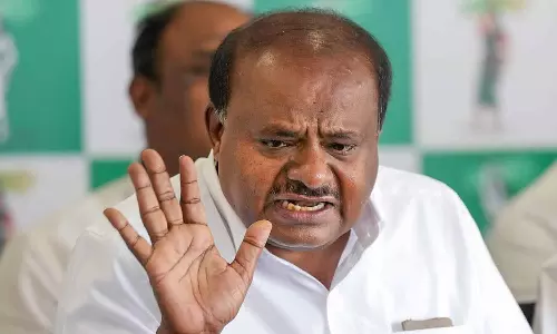 தனது மகனை தோற்கடிக்க வாக்காளர்களுக்கு பரிசு கூப்பன்: காங்கிரசார் மீது எச்.டி.குமாரசாமி குற்றச்சாட்டு