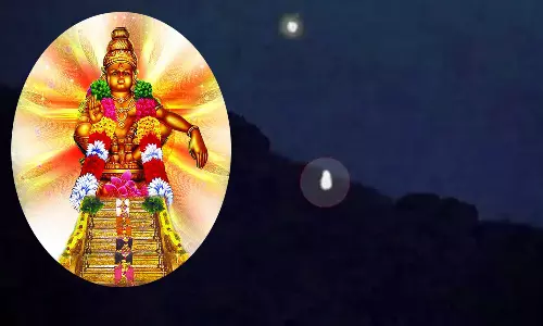 மகரஜோதியில் காட்சி தரும் ஐய்யன்