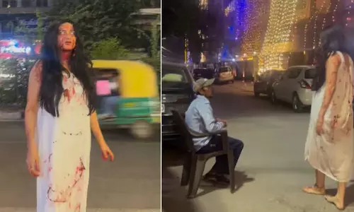 பேய் வேடத்தில் தெருக்களில் உலா வந்த பெண்...