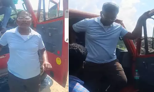 பொதுமக்கள் புகாரால் குப்பை வண்டியில் சென்று ஆய்வு செய்த பா.ஜ.க. அமைச்சர்