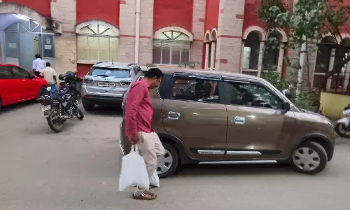 ஜீவனாம்ச பணத்தை சில்லரையாக மூட்டை கட்டி எடுத்து வந்த கணவர்