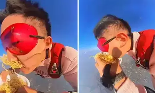 நூடுல்ஸ் சாப்பிட்டு கொண்டு வான்சாகசம் செய்த வாலிபர்- வீடியோ