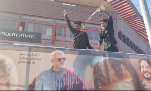 நடிகர் அஜித் கட்-அவுட்டுக்கு ரசிகர்கள் பால் அபிஷேகம்