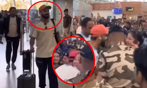 VIDEO: ஏர்போர்ட்டில் பலத்த பாதுகாப்பையும் மீறி பெண் ஒருவரை கட்டிப்பிடித்த கோலி- யார் அவர்?