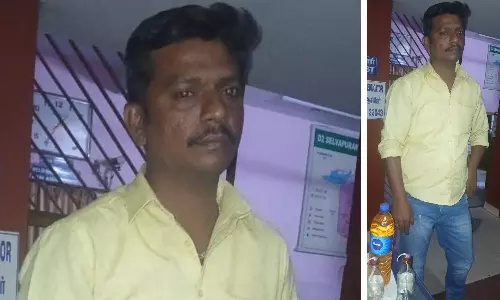 கோவையில் பெட்ரோல் வெடிகுண்டுகளுடன் சிக்கிய வாலிபர் கைது