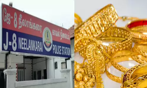 வீட்டின் கதவை உடைத்து 60 சவரன் நகை கொள்ளை - காவலாளி தலைமறைவு