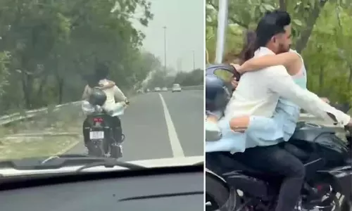 VIDEO: பைக்கில் கட்டிபிடித்தபடி பயணம் செய்த காதல் ஜோடி - ரூ.53,500 அபராதம் விதித்த போலீஸ்