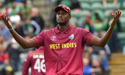 டி20 கிரிக்கெட்டில் அதிக விக்கெட் : பிராவோ சாதனையை முறியடித்த ஹோல்டர்