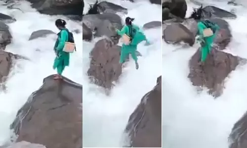 வீடியோ: 2 மாத குழந்தைக்கு தடுப்பூசி செலுத்த உயிரை பணயம் வைத்து கடமையாற்றிய நர்ஸ்