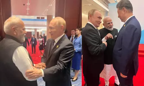 சீனாவில் ரஷிய அதிபர் புதினை சந்தித்து உரையாடிய பிரதமர் மோடி