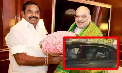 அமித்ஷாவுடன் சந்திப்பு: கைக்குட்டையால் முகத்தை மறைத்துக்கொண்டு வெளியேறிய இ.பி.எஸ்.