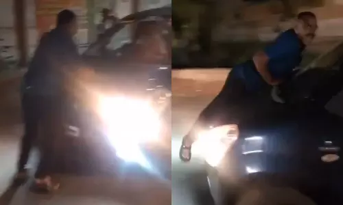 வாலிபர் மீது காரை ஏற்றி இழுத்து சென்ற எஸ்.ஐ - வீடியோ வைரல் ஆனதால் ஆயுதப்படைக்கு மாற்றம்