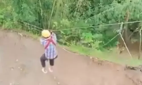 நிலச்சரிவில் சிக்கிய நோயாளிகள்: ஜிப்லைனில் சென்று சிகிச்சை அளித்த டாக்டர்