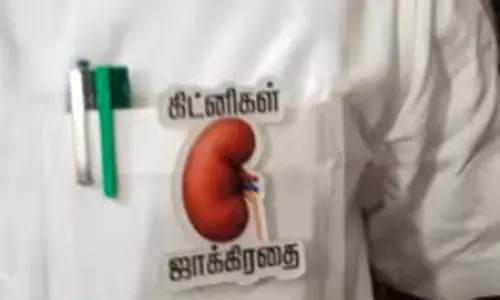சட்டசபைக்கு  கிட்னிகள் ஜாக்கிரதை  ஸ்டிக்கர் அணிந்து வந்த அ.தி.மு.க.வினர்