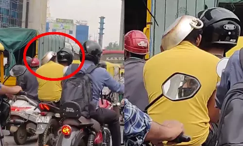 VIDEO: அபராதத்தில் இருந்து தப்பிக்க ஹெல்மெட்டுக்கு பதில் பாத்திரத்தால் தலையை மூடிய இளைஞர்