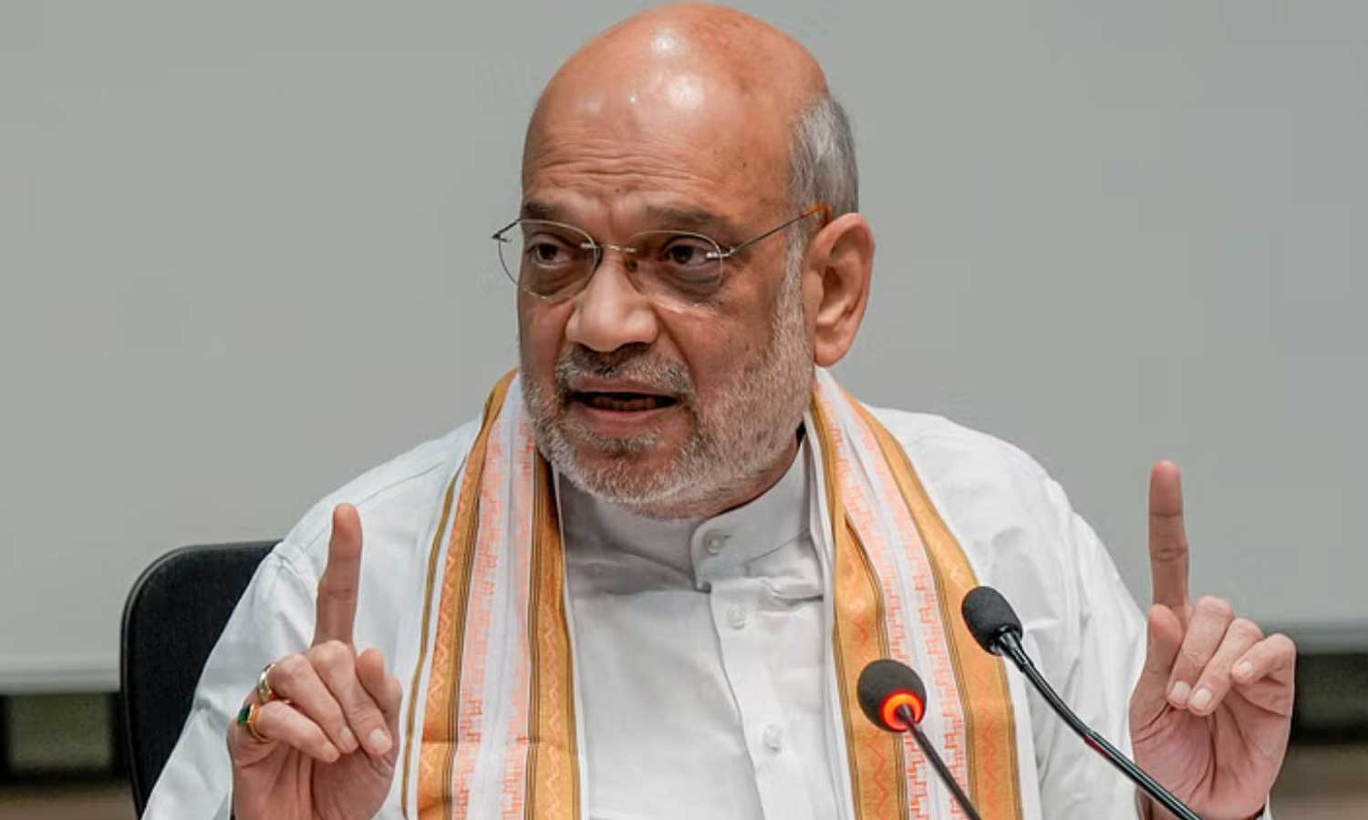 ஊடுருவலை அனுமதிக்காத அரசை தேர்ந்தெடுங்கள்: அசாமில் அமித் ஷா பேச்சு