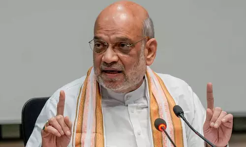 ஊடுருவலை அனுமதிக்காத அரசை தேர்ந்தெடுங்கள்: அசாமில் அமித் ஷா பேச்சு