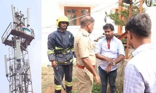 சிஸ்டம் சரியில்லை, அரசியல் மாற்றம் வேண்டும்- செல்போன் டவரில் ஏறி அ.தி.மு.க. தொண்டர் போராட்டம்